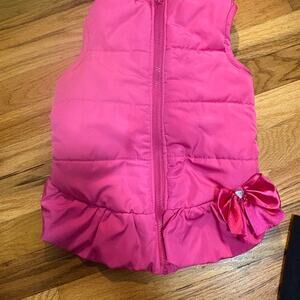 Pink Puffer Vest with Bow Accent for dogs